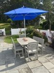 Outdoor seating - dine and relax in the shade by the pool